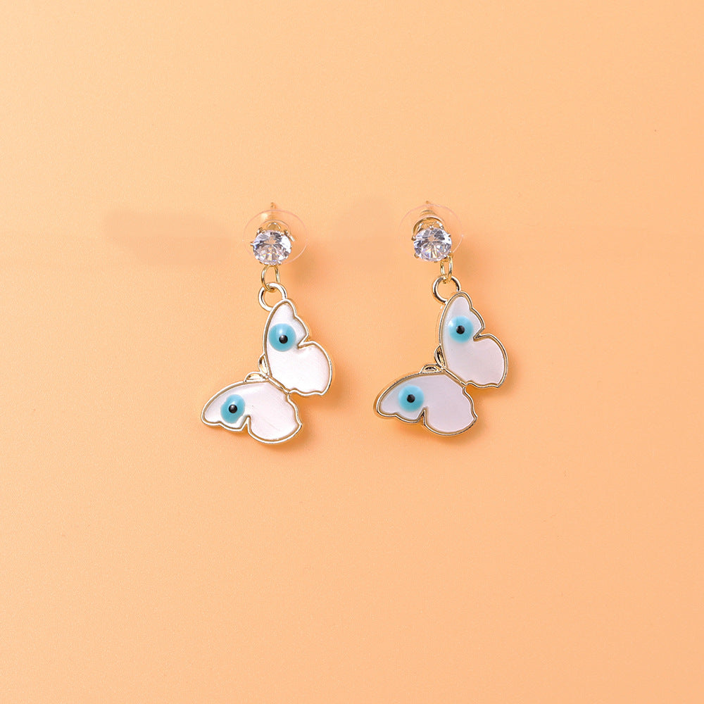 Venta al por mayor Pendientes de la aleación de la mariposa de la palma de la luna del ojo del diablo